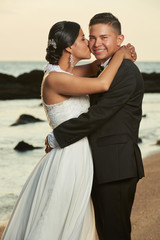 Portrait of hispanic wedding couple