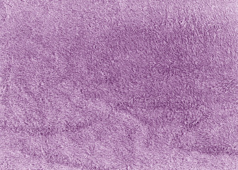 Violet color bath cotton towel texture.