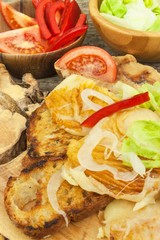 Grilled cheese and toasted baguette. Vegetarian barbecue. The food at the party.