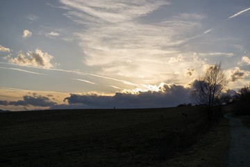 Sunset and sunrise with dramatic colorful clouds. Slovakia