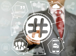 Hashtag social media network business web concept. Businessman touched hash tag icon on virtual...