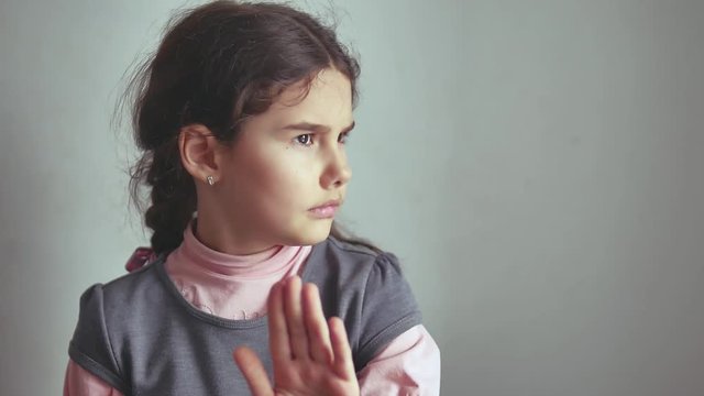 girl teen no gesture shakes her head, denying the dissatisfied opposition