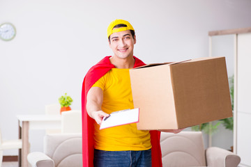 Superhero delivery guy with box