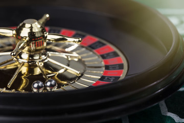 Image of decorative casino roulette. Focus on balls