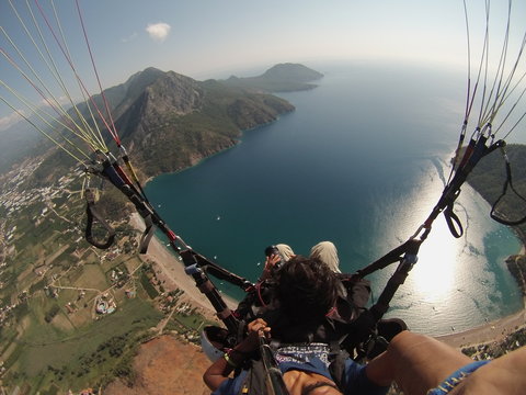 Fly in the sky above laguna Paragliding tandem