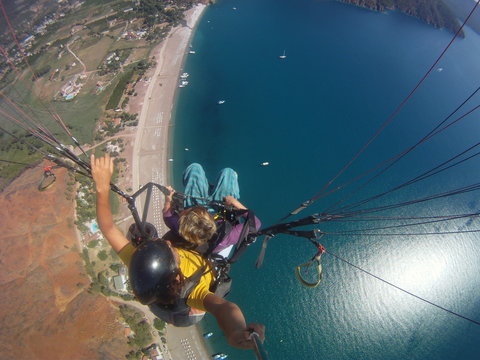 Fly in the sky above laguna Paragliding tandem
