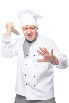 Vertical portrait of a crazy aggressive chefs on a white background