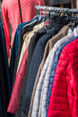 Obraz premium Winter clothes hanging at a store