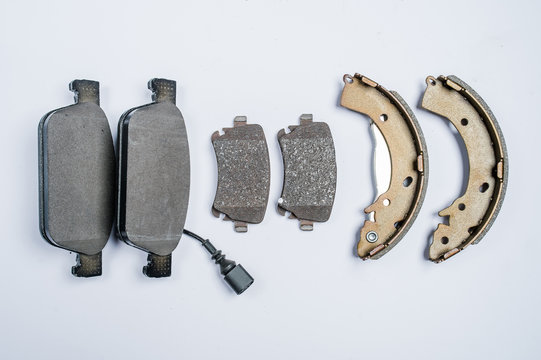 Brake pads for car on white background