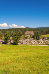 The Cemetery Chapel of St. Sebastian in Maniowy village. Interesting historic wooden building forming the Wooden Architecture Route in Malopolska. Poland.