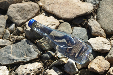 Water bottle on a stone background
