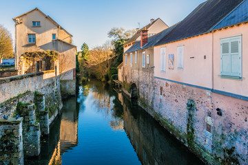 Fototapeta na wymiar Eure River embankment in a small town Chartres. France.