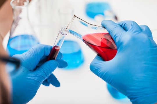 Man researcher carrying out scientific research.