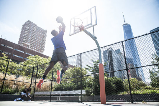 Basketball player playing outdoors