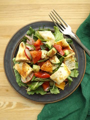 Vegetarian salad fattush with fried pita. Arab Middle Eastern cuisine. 