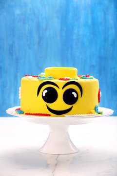 Yellow Birthday Cake On A Stone Background