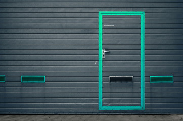 Garage gate with ventilation grilles. Large automatic up and over garage door with inclusion of...