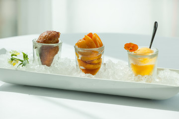 Rum-baba with mini-orange salad and grapefruit granita.
