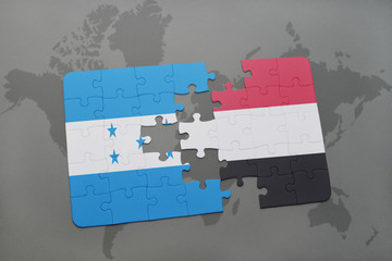puzzle with the national flag of honduras and yemen on a world map