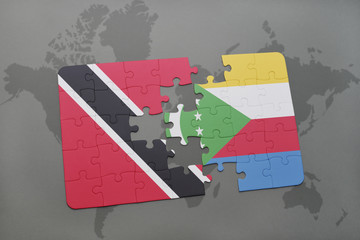 puzzle with the national flag of trinidad and tobago and comoros on a world map