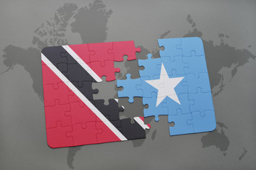 puzzle with the national flag of trinidad and tobago and somalia on a world map