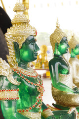 Fototapeta premium green buddha statue