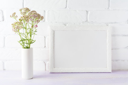 White landscape frame mockup creamy pink flowers in cylinder vase