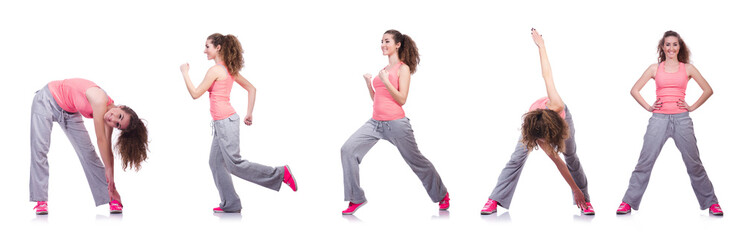 Young female doing exercises on white