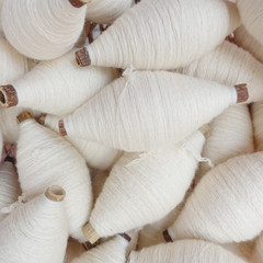 Multicolored bobbins of sewing cotton threads