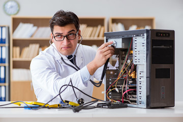 IT technician repairing broken pc desktop computer