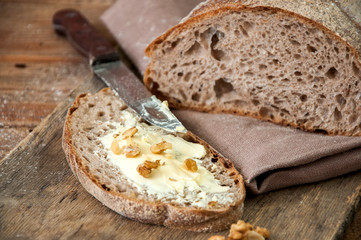 Freshly baked homemade artisan sourdough rye and white flour bread.