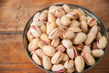 Pistachios in a metal vintage bowl