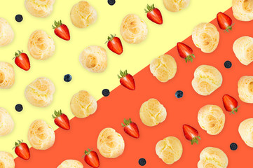 background pattern, seamless pattern, dessert background pattern,  Choux Cream with fresh blueberry and strawberry decorated on colorful background pattern.