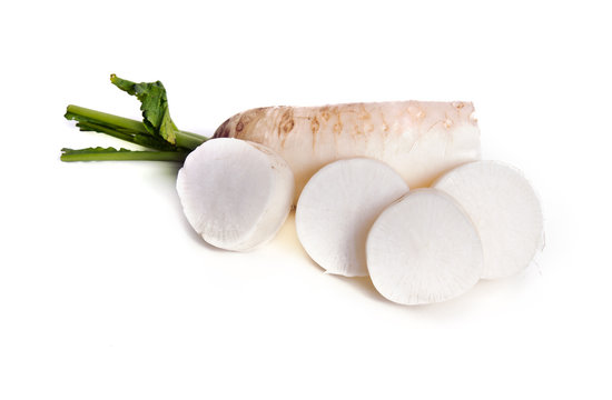 Fresh white radish with slices isolated on white background