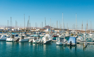 Fototapeta na wymiar Yachts floating in the habour in Lanzarote, Spain