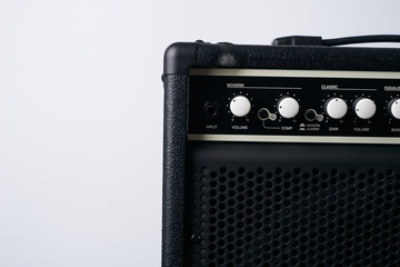 Electric bass Guitar black leather Amplifier on White Background.