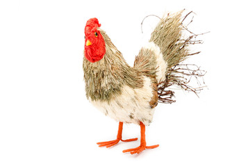 Decorative rooster prepared from natural materials. Easter decoration. Interior, garden decor. Rooster prepared from branches and straws. Isolated on white background. Side view.