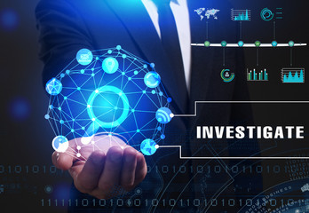 Business, Technology, Internet and network concept. Young businessman working on a virtual screen of the future and sees the inscription: Investigate