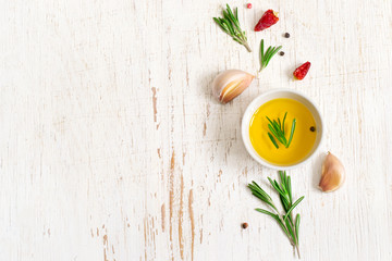 Olive oil, rosemary and spices.