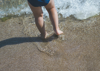 Little legs on the beach.