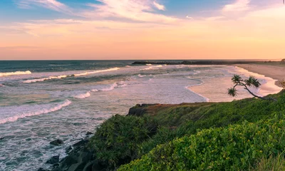 Zelfklevend Fotobehang The Pinky sunset in summer time on the beach in Ballina, Byron bay, Australia © purmakdesigns