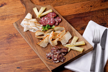 Cheese and cured meat charcuterie selection salami