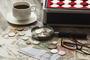 Different old collector's coins and banknotes