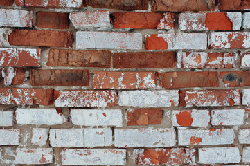 Old brick wall with white and red bricks