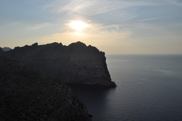 Palma de Mallorka, Spain - 27 jule 2014: A lot of people everyday watch sunset from viewing platform of the cape Formentor.