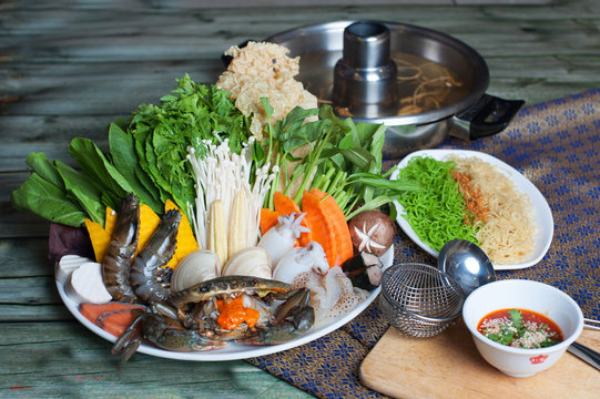 Special seafood hot pot with shrimp, crabs, vegetables, clams an