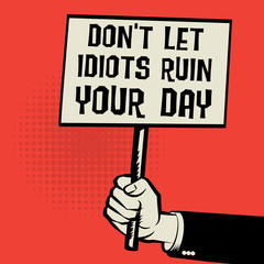 Poster in hand, text Don't Let Idiots Ruin Your Day