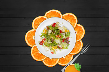 Dietary food. Salad, orange and clean page
