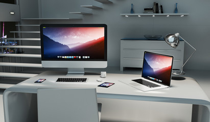 Modern dark desk office interior with computer and devices 3D rendering