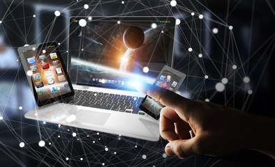Businessman touching laptop phone and tablet with his finger 3D rendering